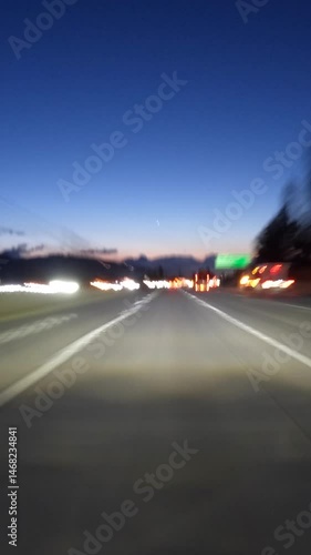 Dawn driving motion blur time lapse on the 210 freeway through Pasadena in Los Angeles County California.  Vertical View.
