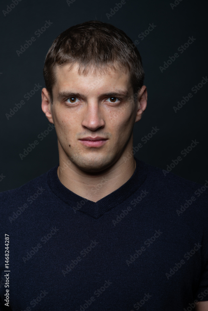 Serious Young Man Portrait in Studio o Serious Young Man Portrait in Studio o
