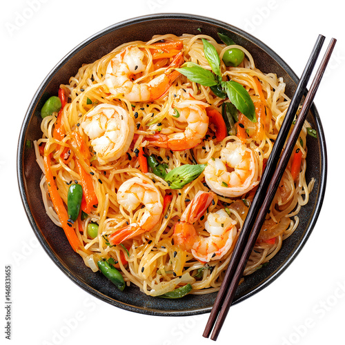 Rice noodles with shrimps and vegetables close-up on the table. top view , isolated on transparent background . PNG, cutout, or clipping path.
