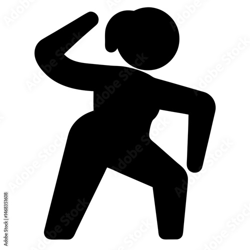 Silhouette of a woman performing a dance move or exercise routine