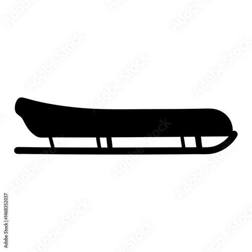 Silhouette of a classic wooden toboggan or sled ready for winter fun