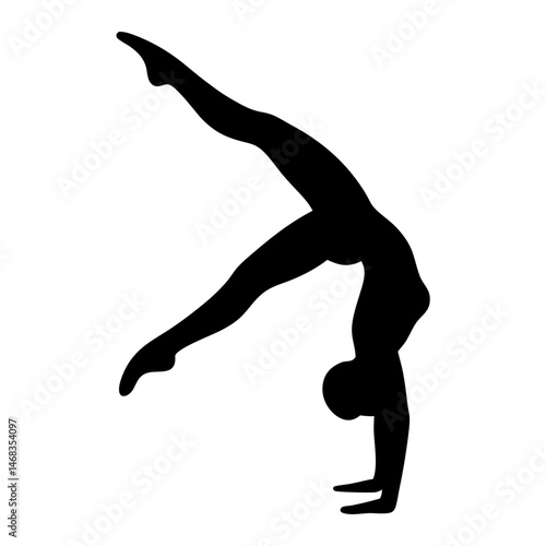 Silhouette of gymnast performing a handstand with split legs artistic expression