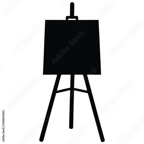 Silhouette shows a dark art easel standing on its three legs firmly
