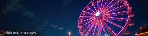 Immense Ferris wheel-like merry-go-round, brightly lit at night , sky, bright, colorful