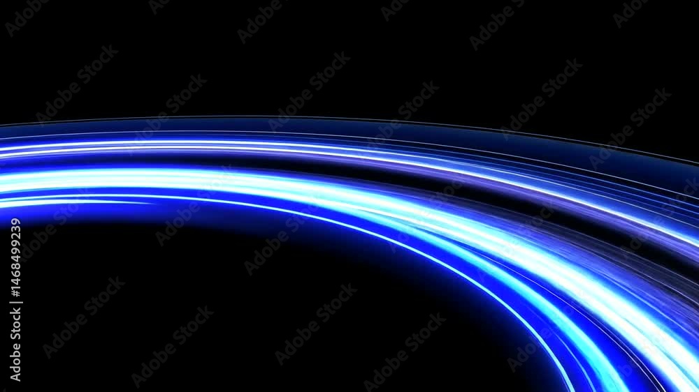 Abstract blue and white luminous streaks curve gracefully across a ...