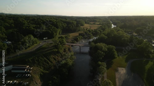 Aerial over bridge over Yadkin River in Elkin North Carolina at sunset photo