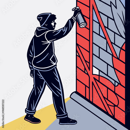 A person in a hoodie and beanie spray painting a brick wall with a spray can art