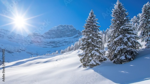 Wallpaper Mural Snowy Mountain Landscape with Evergreen Trees and Bright Sun in Clear Blue Sky on a Winter Day in Peaceful Scene Torontodigital.ca