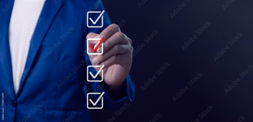 Business performance checklist, businessman using laptop doing online checklist survey, filling out digital form checklist, take an assessment, questionnaire, evaluation, online survey, online exam.