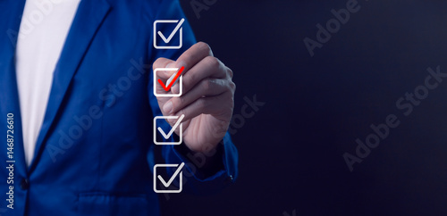 Obraz na płótnie Business performance checklist, businessman using laptop doing online checklist survey, filling out digital form checklist, take an assessment, questionnaire, evaluation, online survey, online exam. w salonie