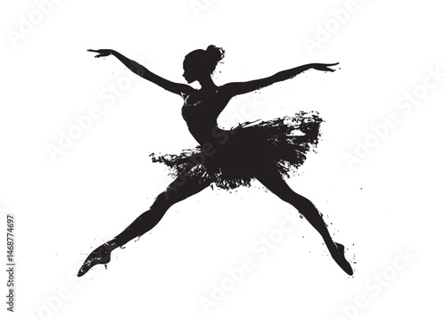  Silhouette of a ballerina on pointe, arms in a graceful arc.