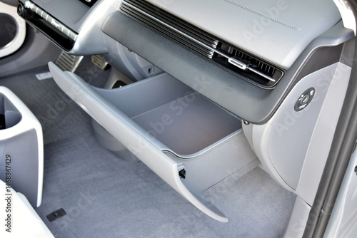 Opened car glove box compartment