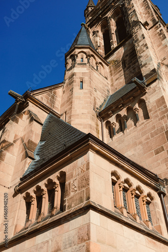 Obraz na płótnie Ancient city buildings. Ancient brick church. Catholic cathedral made of stone. w salonie