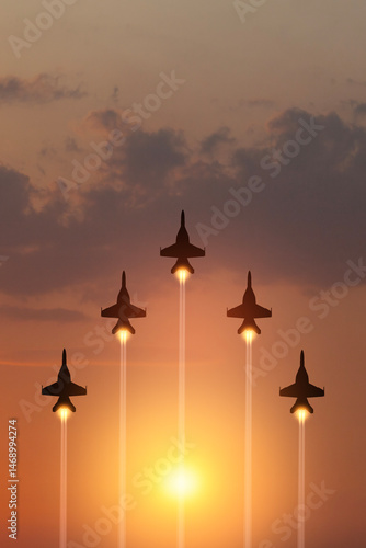 Air Force Day. Aircraft silhouettes on background of sunset. Combat flight of interceptors on a mission. Vertical poster.