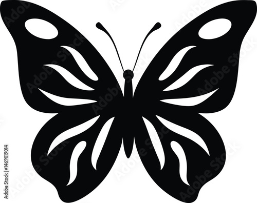  Black silhouette of a butterfly with intricate wing patterns.