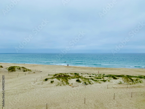 Coastal dunes and wide sandy beach at Orrestranda, Norway
