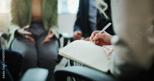 Business people, hands and writing with book in meeting for support group, therapy session or counseling. Closeup, hr or taking notes with team for company dispute or conflict resolution at workplace © peopleimages.com