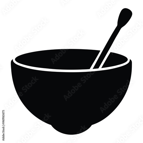Isolated on black, a wooden mortar with a pestle sits, suggesting kitchen or pharmacy use for grinding
