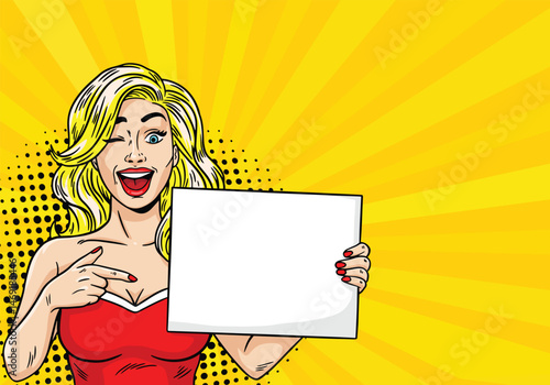 Young beautiful blonde girl with blank poster for your advertising in pop art style. vector illustration on color background