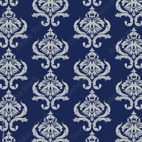Seamless pattern with damask ornaments. Textured background.