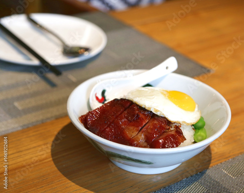Char siu barbecued pork rice with fried egg Cantonese Hong Kong cuisine