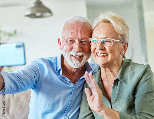 senior woman man couple elderly love elderly selfie camera mobile phone smartphone photo picture portrait male old together active vitality cell phone hug