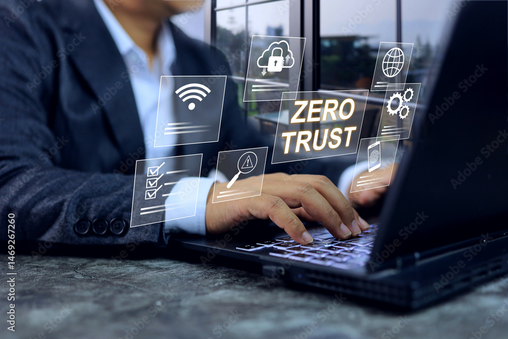 Fototapeta premium Zero Trust concept with businessman working with security system where every user or devices must be authenticated before being granted access to organization’s systems, applications, or assets.