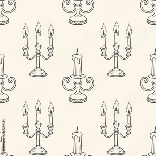Seamless pattern with hand drawn vintage candelabra with lit candles. Sketch illustration, background.