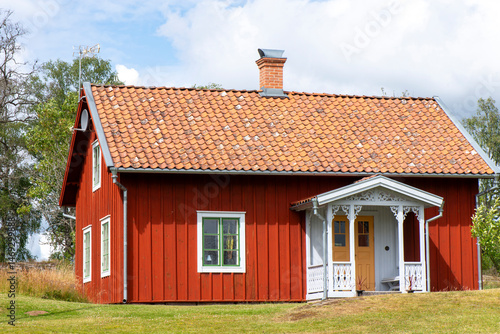 Obraz na płótnie Schwedisches Holzhaus w salonie