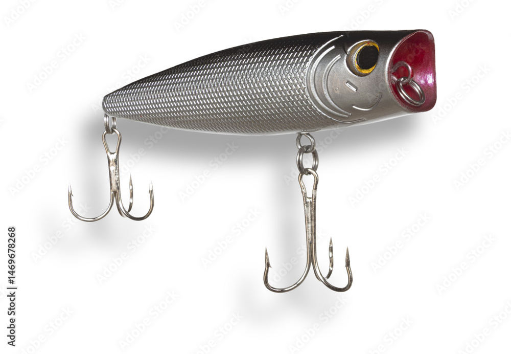Topwater artificial fishing lure with dropshadow below