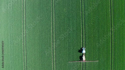 Aerial View of Tractor on Green Field