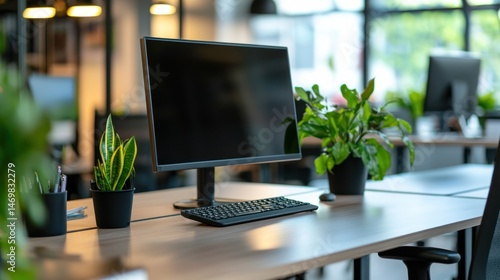 Wallpaper Mural A modern office workspace with a desk, computer monitor, and plants in a well-lit, spacious office environment. Torontodigital.ca