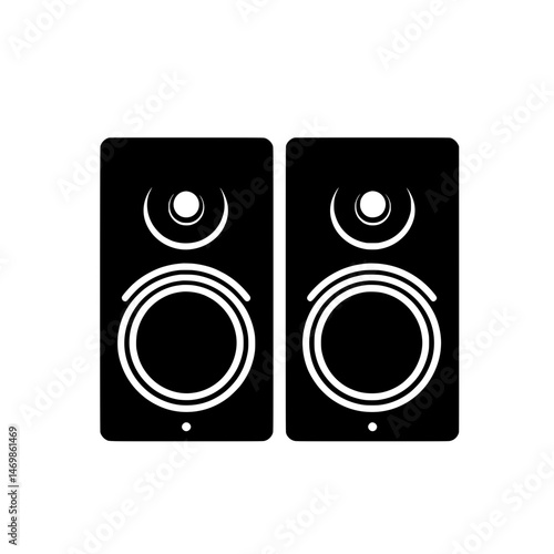 Pair of audio speakers in black icon style representing stereo system, music equipment, or sound technology