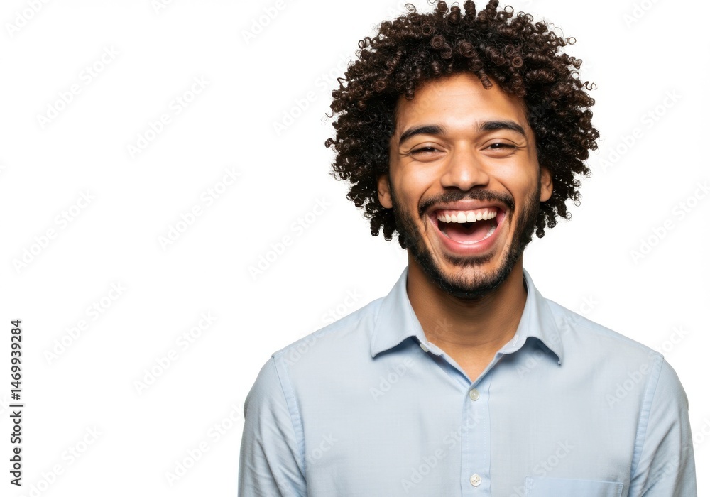 Fototapeta premium Happy Young Man with Curly Hair Laughing Isolated on White Background