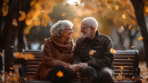 Obraz na płótnie Joyful senior couple enjoying autumn together in the park w salonie