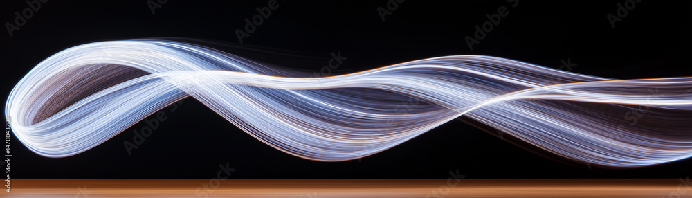 Fototapeta premium Abstract light wave on black background energy flow motion