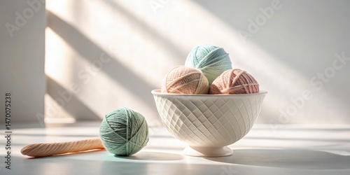 Wallpaper Mural Sunlit Yarn Balls in a Decorative Bowl, Ready for a Cozy Crafting Project Torontodigital.ca