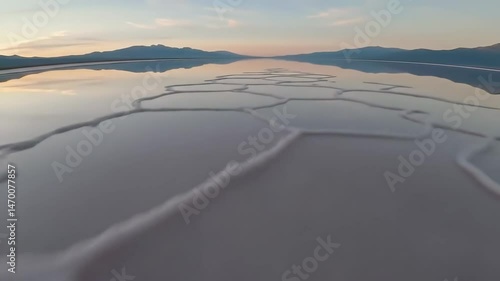 Surreal Salt Flat Reflection at Sunrise