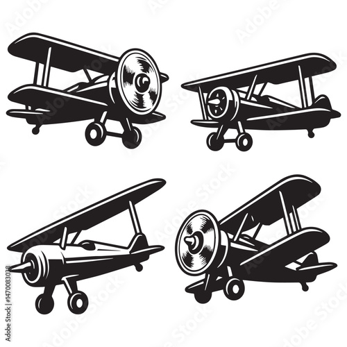 Four vintage biplanes in black silhouette