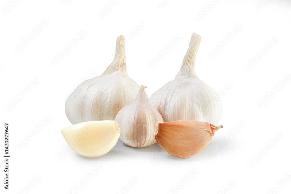 Garlic bulb and clove isolated. Garlic bulbs with sliced cloves on white background. White garlic bulb composition. With clipping path. Full depth of field. Garlic bulb and clove isolated. Garlic bulbs with sliced cloves on white background. White garlic bulb composition. With clipping path. Full depth of field.