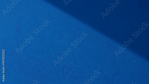 Dark blue textured plaster wall background