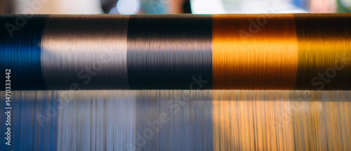Fotografía Silk thread from weaving machine traditional craft, a vibrant tapestry of color