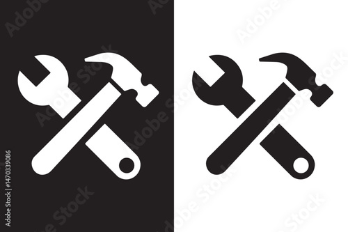 Crossed wrench and hammer icon vector illustration
