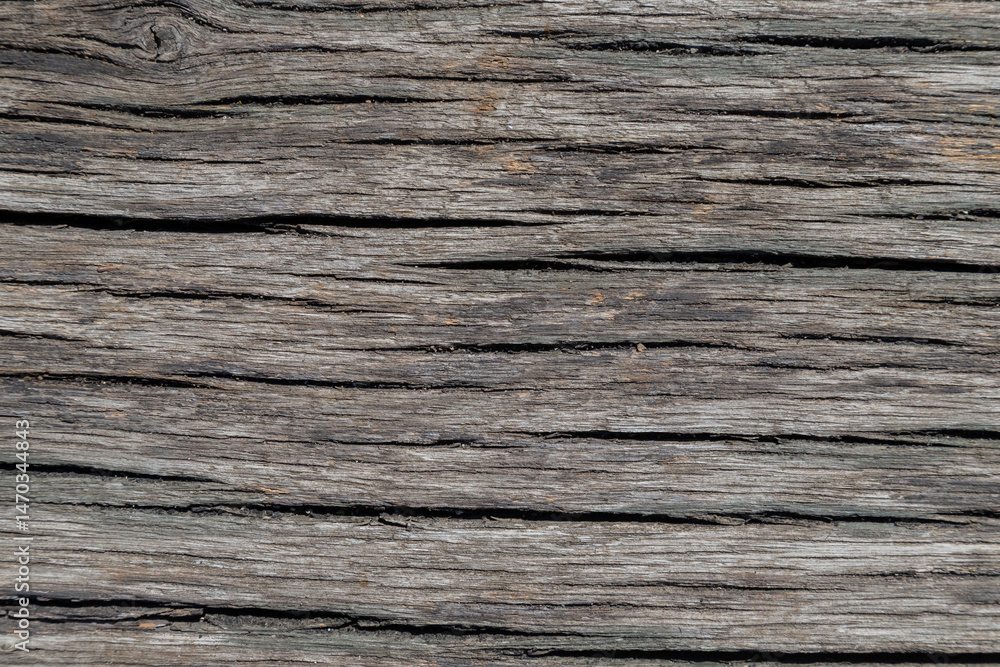 Fototapeta premium Close-Up of Weathered Wooden Plank With Natural Textures and Patterns