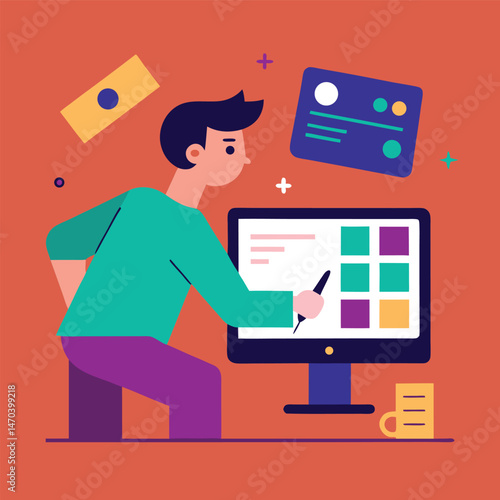Young Man Using Stylus on Computer Screen for Design Project