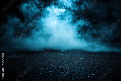 Dark, smoky scene with blue mist on a paved surface
