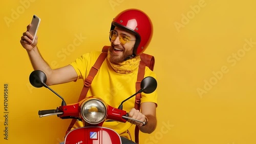 A smiling delivery man on a red scooter with a matching helmet is checking his phone. He is wearing a yellow shirt and scarf against a yellow background, looking ready to deliver an order.