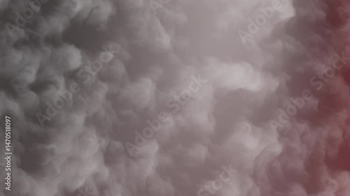 Dense white and grey smoke or fog billows upward with a subtle red hue on the right, creating a dramatic, atmospheric texture. Captured close-up with soft lighting and no visible background.