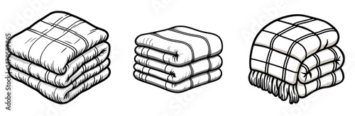 Cozy blankets and quilts stacked neatly in a row for winter warmth and comfort at home