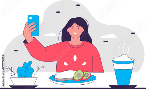 A smiling person takes a selfie with a smartphone at a table with food and a drink.